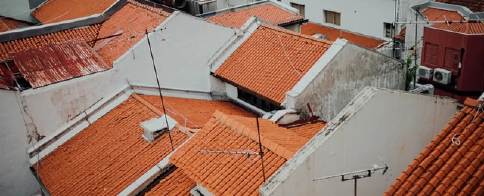 Rows of orange clay tile rooftops