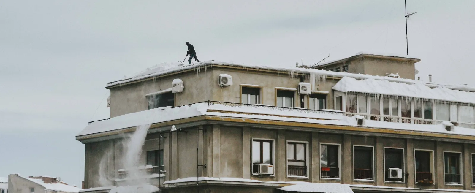 Flat roof of a commercial building against the sky