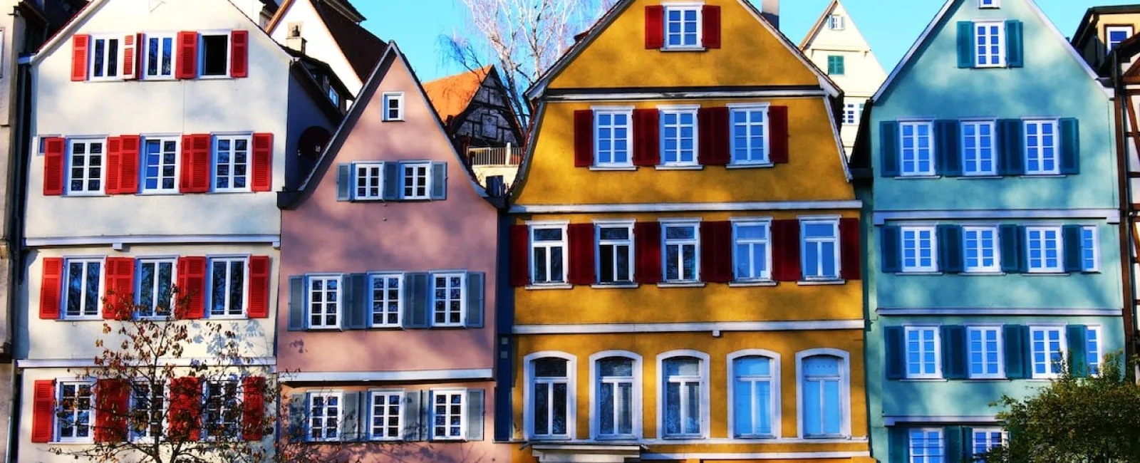 Colorful row houses with pitched roofs
