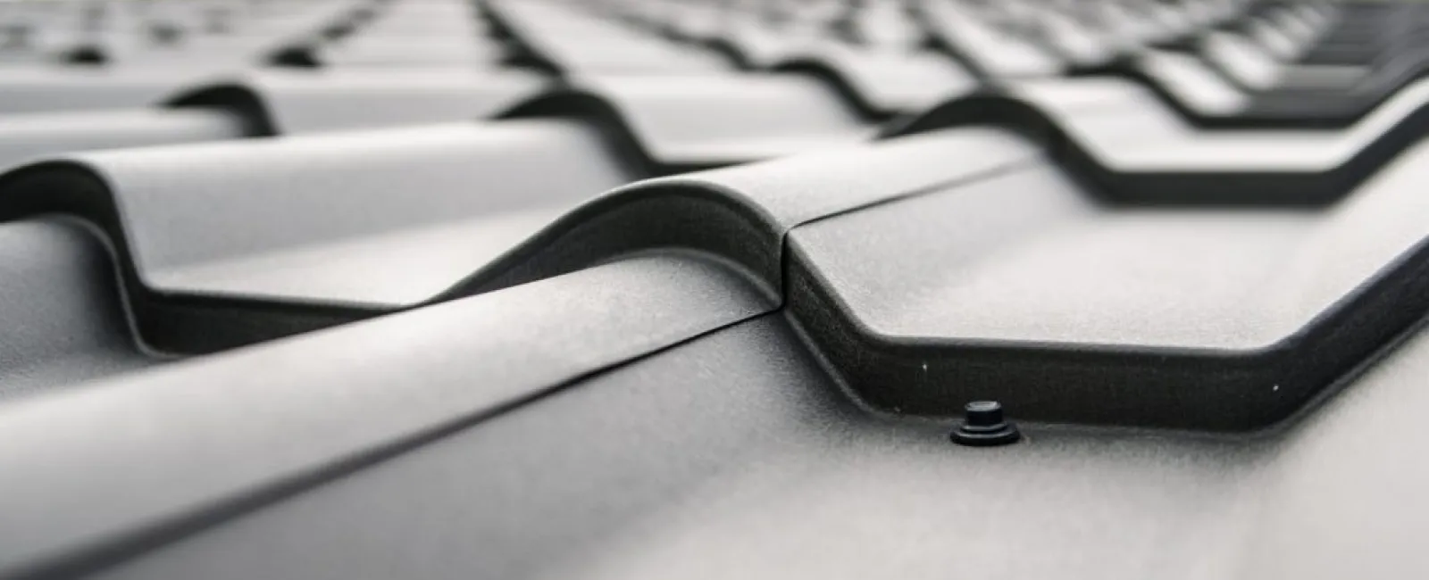 Close-up of gray metal roof tiles